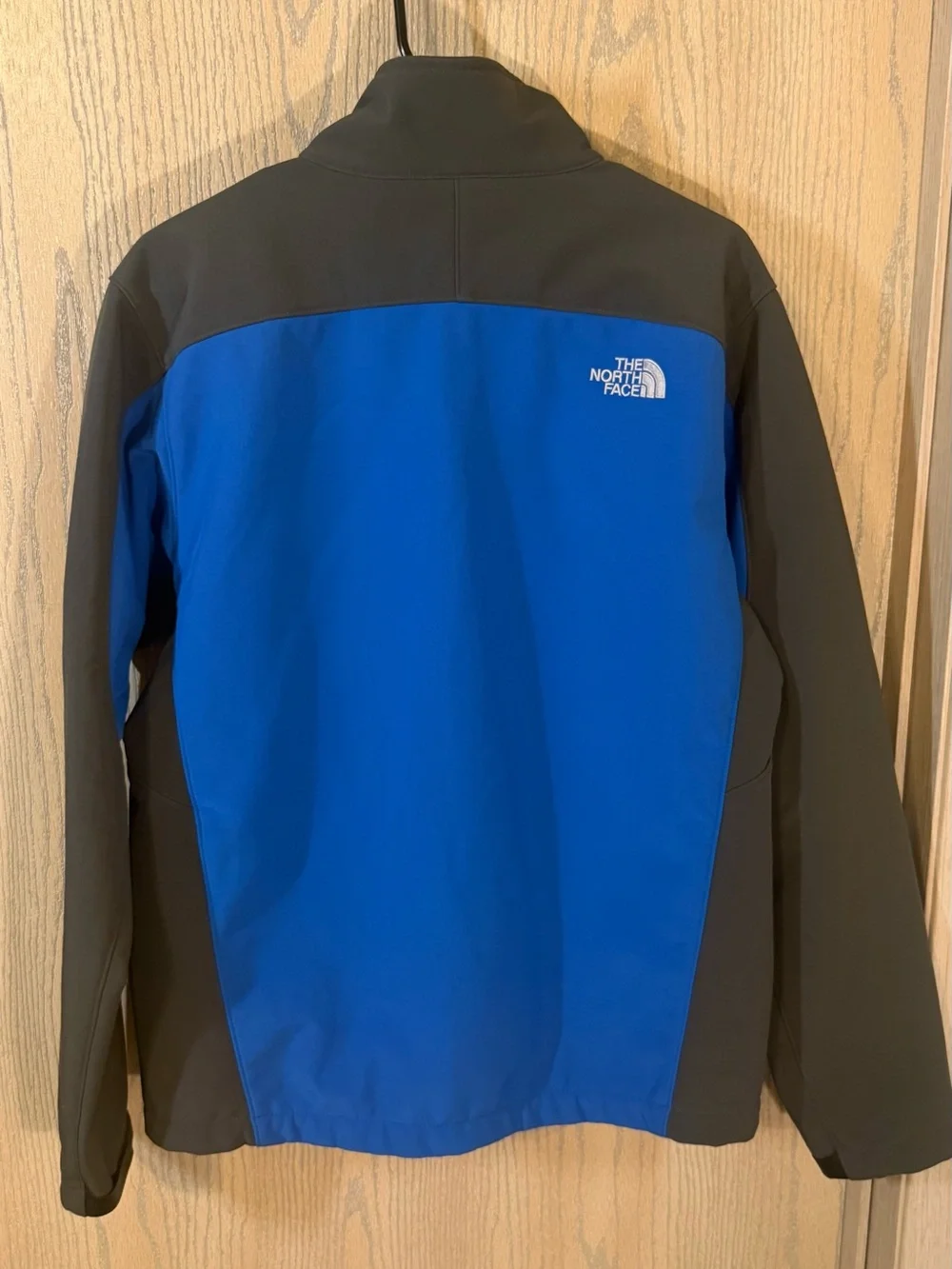 The North Face Men’s Blue and Charcoal Softshell Jacket
